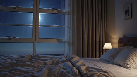 A cozy bedroom scene with moonlight streaming through a window, shot from a low angle