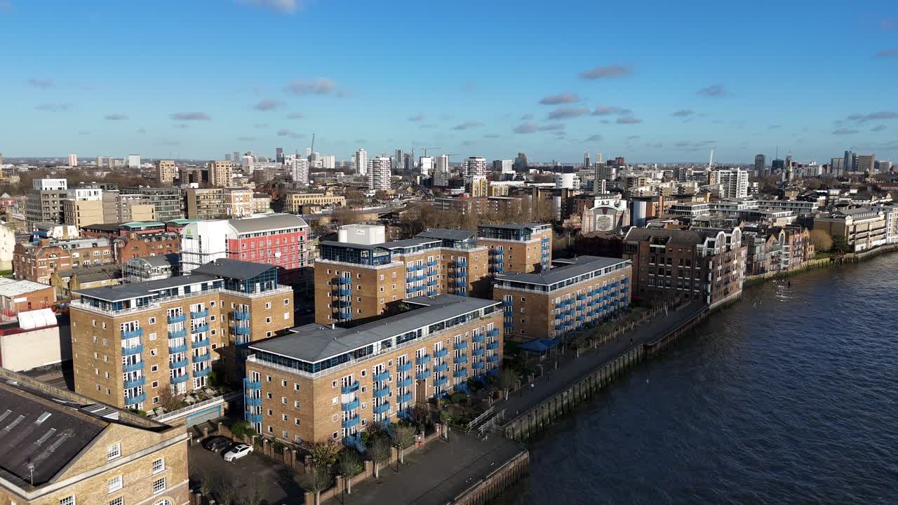 Wapping London UK riverside apartments rising drone,aerial reveal East London