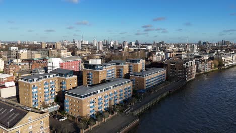 wapping london uk riverside apartments rising drone,aerial reveal east london