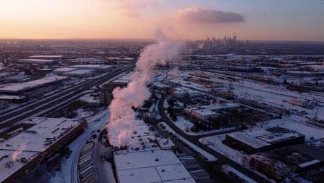 a steaming factory in canada during winter