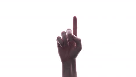 a male hand with the index finger pointing up against white background - close up, studio shot