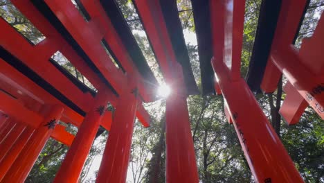 Bottom-up-view-of-the-vermilion-arches-of-Fushimi-Inari-Taisha-in-Kyoto-Japan