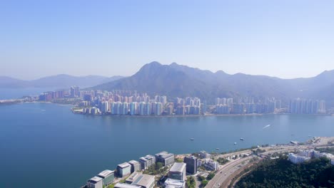 huge tall buildings of the incredibly popular ma on shan seen from science park on a sunny summer day in hongkong