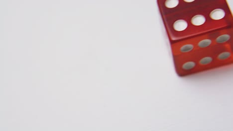 dices-with-white-spots-on-light-background-extreme-closeup