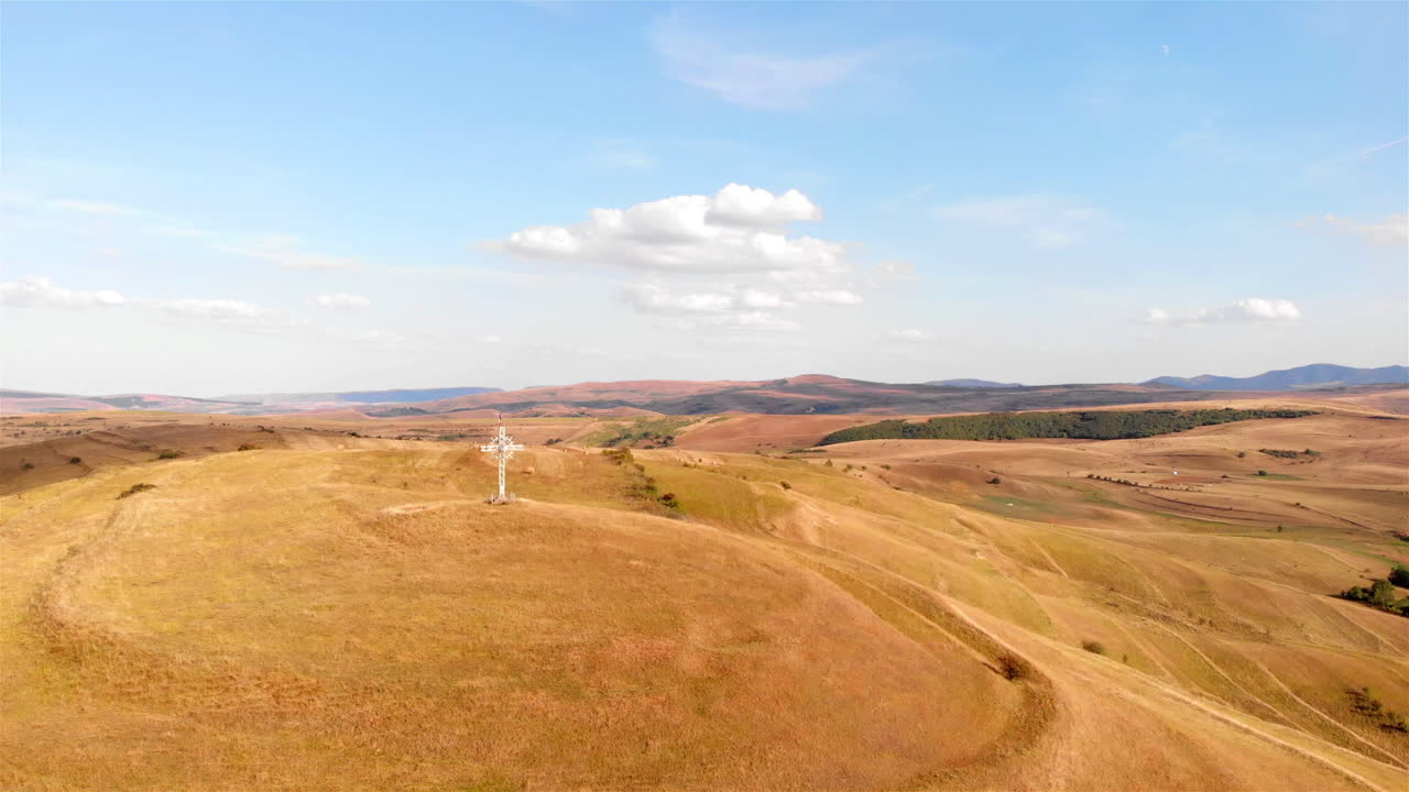 Large Cross on High Hill in Europe Aerial view