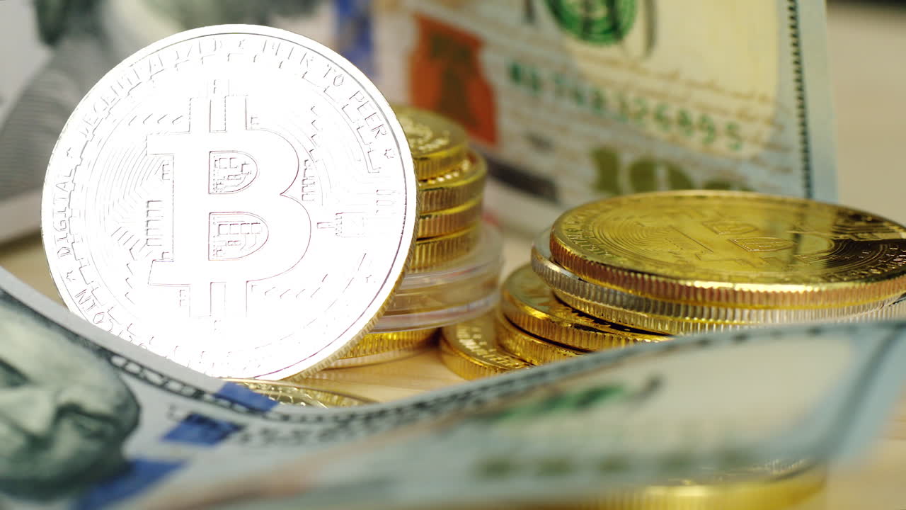 Close up crypto coins with silver bitcoin and dollars
