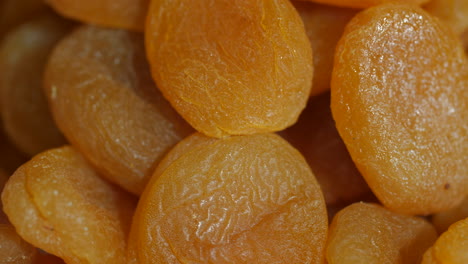 macro shot of dried apricots rotating on turntable