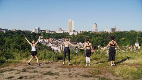 women exercising outdoors in cityscape