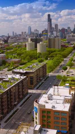 beautiful panorama of chicago, illinois on sunny summer day. tremendous skyscrapers at backdrop. vertical video