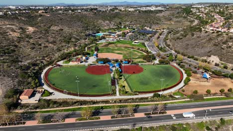 rotating drone view of alga norte park in carlsbad, california