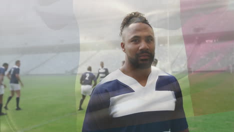 animation of biracial male rugby player in rugby pitch over flag of france