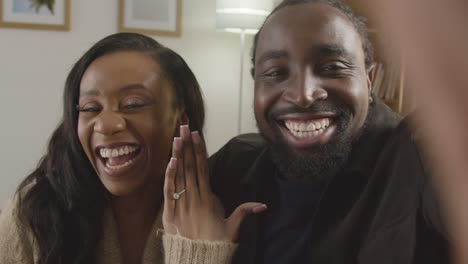 POV-Shot-Of-Couple-Announcing-Their-Engagement-On-Video-Call