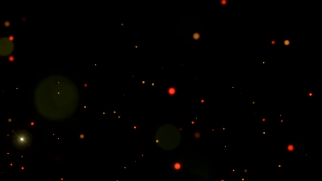 partículas de oro bokeh abstractas con estrellas brillantes brillando en el fondo.