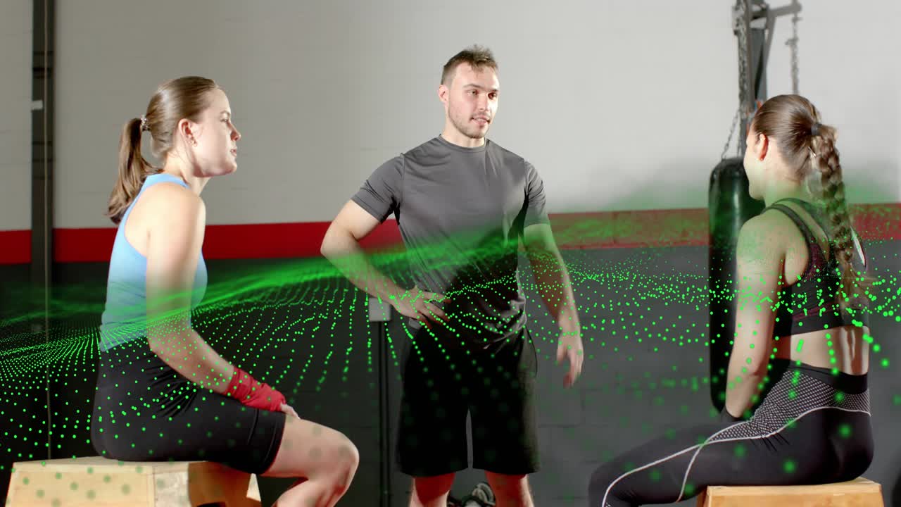 Pair training boxing, right initiating jabs, coach correcting form and green overlay sweeping