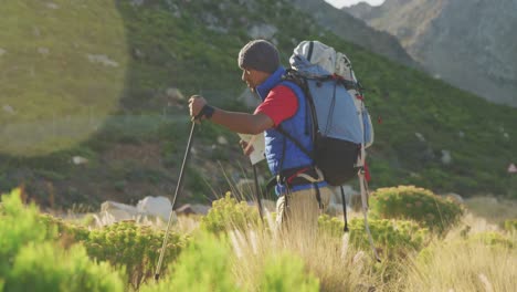 Mixed-race-man-with-prosthetic-leg-hiking-in-nature