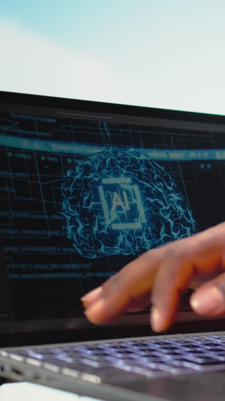 Vertical video Close up of offshore platform worker using AI on laptop