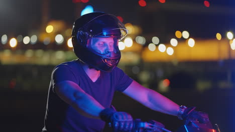 motorcyclist at night in city