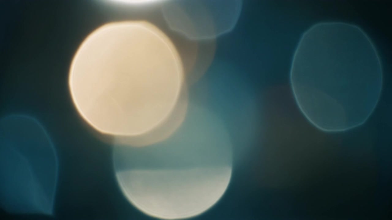 Abstrakt baggrund med blødt glødende bokeh-lys