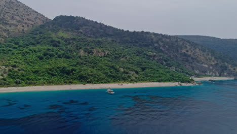 beach on coast of ionian sea in albania, view from drone