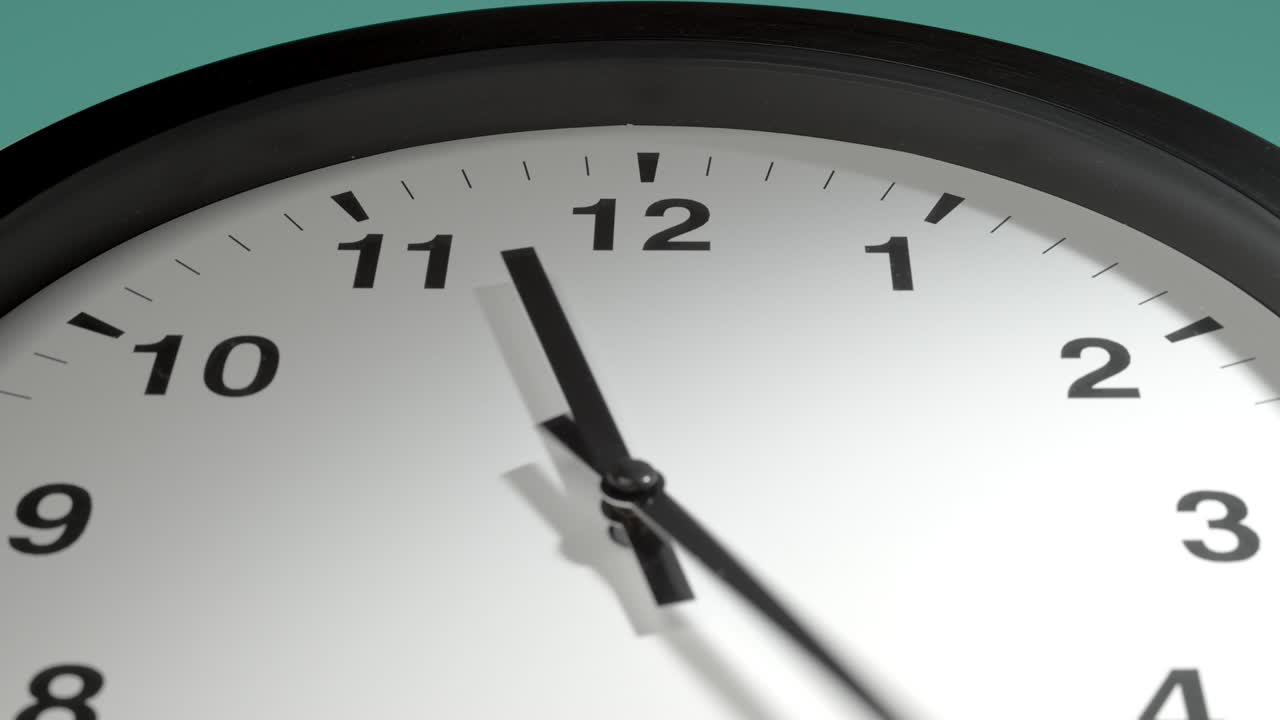Clock Face on Cyan Blue Aquamarine Celadon Sea-Green Wall in Time Lapse