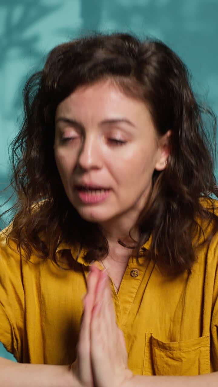 Close-up of Emotional Woman Talking and Gesturing