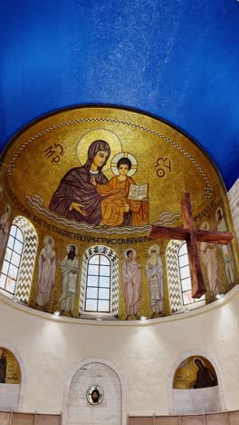 interior of dormition abbey with altar and mosaics