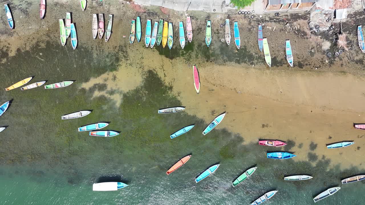 Drone view of boats in a fishing village near the mouth of the São Francisco River