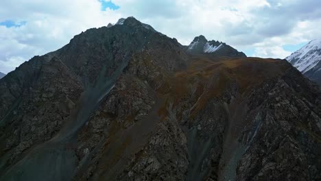 aerial view, kyrgyzstan mountain range, alpine cliffs, rugged terrains