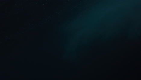 dark underwater abstract