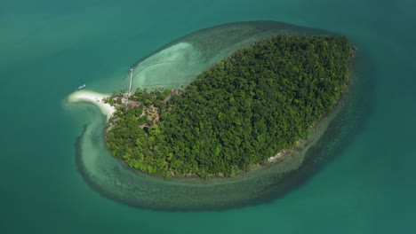 aerial drone shot of private tropical island in thailand