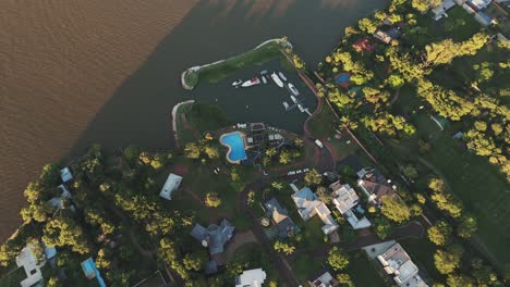 aerial view of luxury private neighborhood on the coast of the paraná river, misiones province, argentina