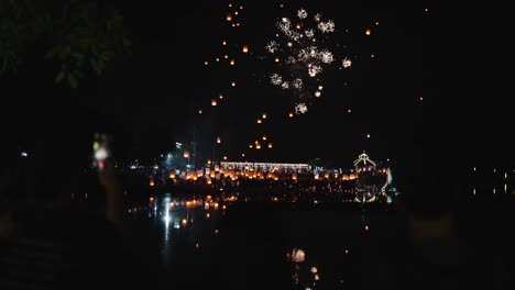 night festival with sky lanterns and fireworks