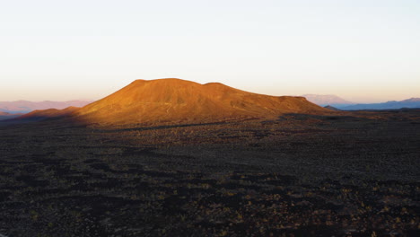 sunrise light on desert mountains in mojave national preserve, south california