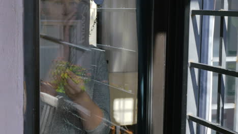 woman changing sign from closed to open