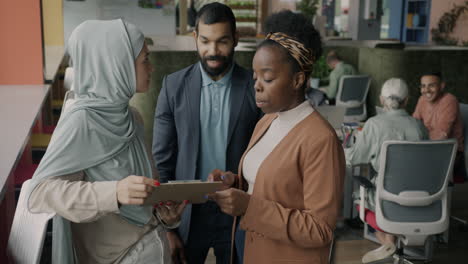 diverse team in a modern office discussing a project