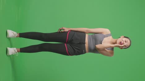 mujer con ropa deportiva, fondo de pantalla verde