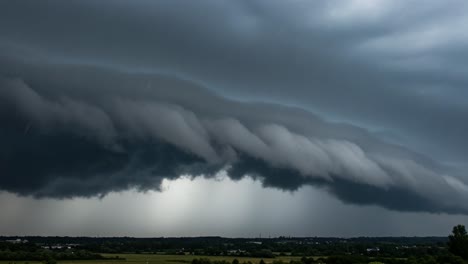 dramatic shelf cloud formation during a storm