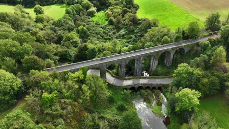 ireland epic locations drone circling the impressive structure of durrow viaduct on the waterford greenway tourist attraction ireland