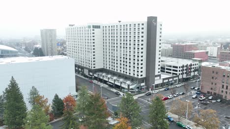 aerial shot pulling away from the davenport grand hotel in spokane's downtown district