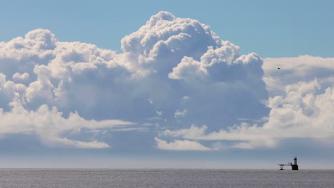 Lighthouse-on-the-horizon-in-big-bay