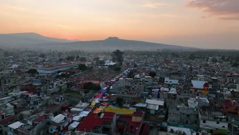 Flying-around-the-Mixquic-cemetery,-during-Dia-de-los-Muertos-in-Mexico---aerial-view