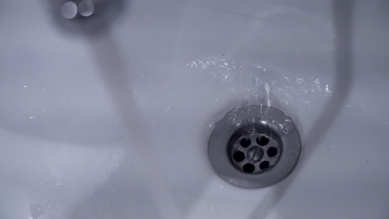 Water Draining into Sink