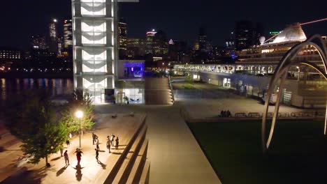 nightlife in montréal, a seaport in the background. aerial view.