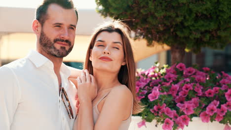 couple posing outdoors