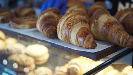 close-up of delicious golden brown croissants in a bakery display