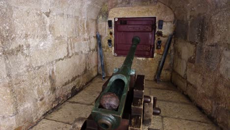 antique cannon inside belem tower in lisbon, portugal - close up