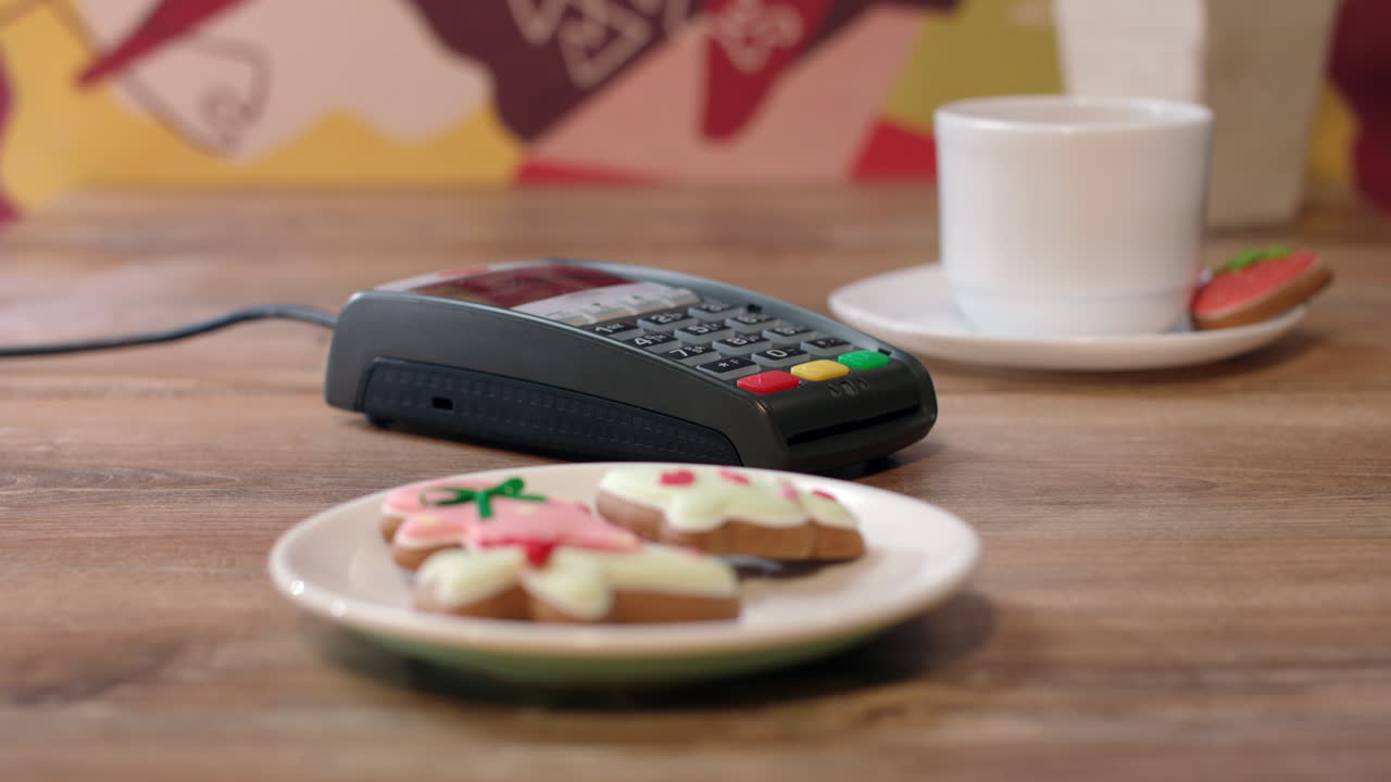 NFC payment technology. Customer paying by contactless credit card
