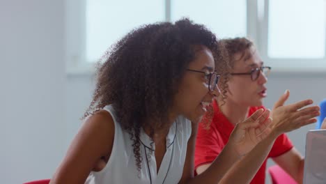 African-businesswoman-arguing-with-colleagues-in-meeting-room