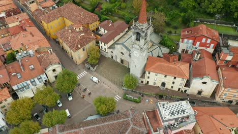 AERIAL:-Top-Down-Shot-of-Varenna-Town-Church-near-Lake-Como