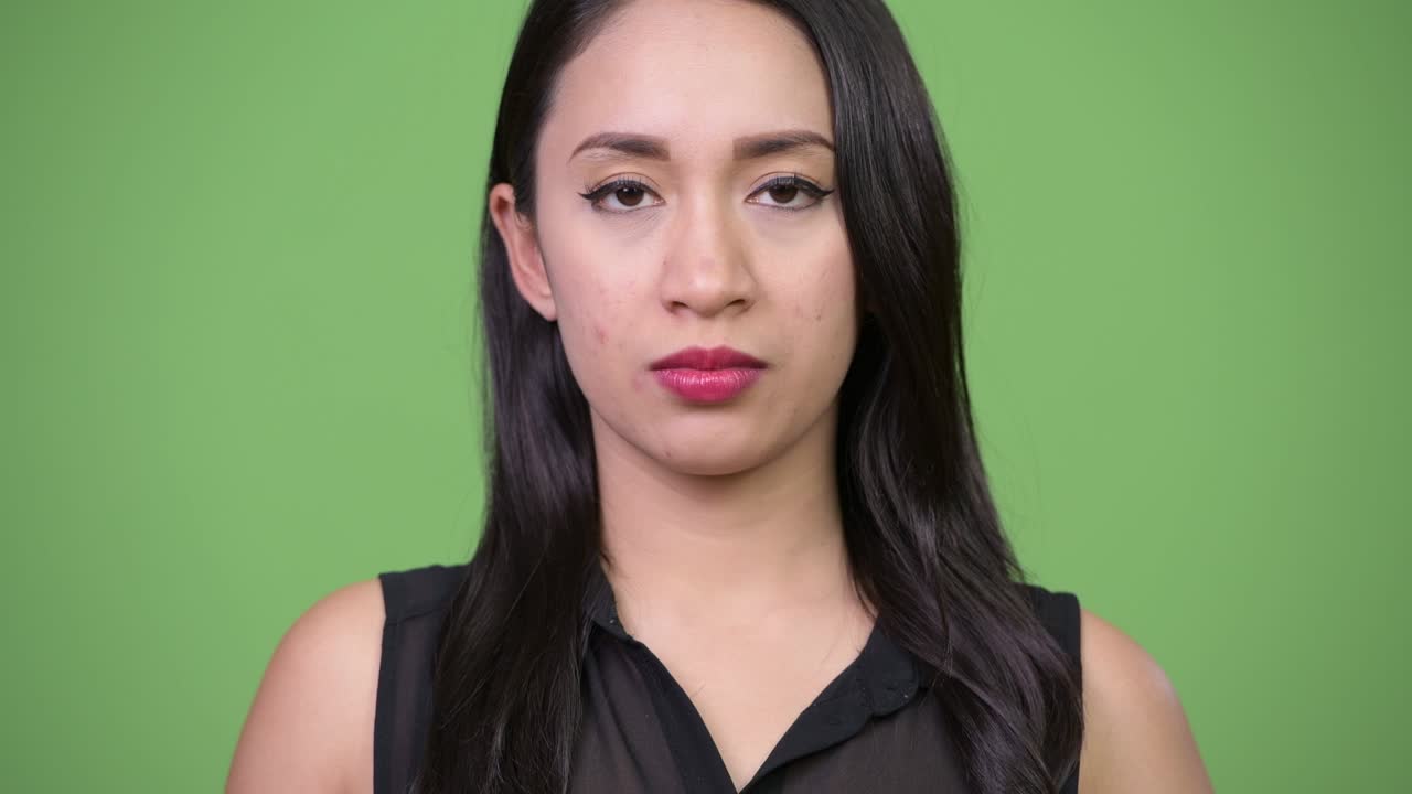 Young beautiful Asian businesswoman covering mouth as three wise monkeys concept